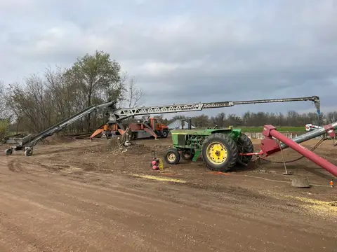 Heavy machinery and conveyor systems on a construction site